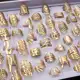 20pcs Anéis De Aço Inoxidável Para Homens E Mulheres Padrões De Corte A Laser Revestidos Ouro De Pra em oferta