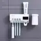 Porta Escovas De Dente Esterilizador Com Dispenser De Pasta Desinfecção UV em oferta