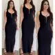 Vestido Femino longo malha canelada com zíper no decote em oferta