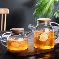 Imagem da promoção Kit 2 Jarras de Vidro Tampa Bambu Vai ao Fogo e Geladeira Chaleira Jarro Bule Café Chá Suco Agua
