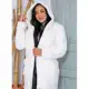 Casaco Teddy max. longo com capuz em oferta